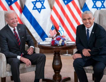 President Joe Biden, left, and Israeli Prime Minister Yair Lapid address the media following their meeting in Jerusalem Thursday, July 14, 2022. (AP Photo/Evan Vucci)