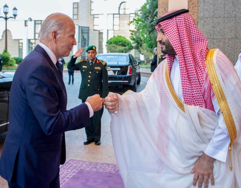 In this image released by the Saudi Royal Palace, Saudi Crown Prince Mohammed bin Salman, right, greets President Joe Biden with a fist bump after his arrival at Al-Salam palace in Jeddah, Saudi Arabia, Friday, July 15, 2022. (Bandar Aljaloud/Saudi Royal Palace via AP)