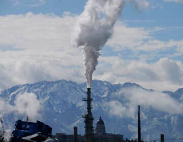 File photo: The Utah State Capitol, rear, is shown behind an oil refinery on Thursday, May 12, 2022, in Salt Lake City. (AP Photo/Rick Bowmer, File)