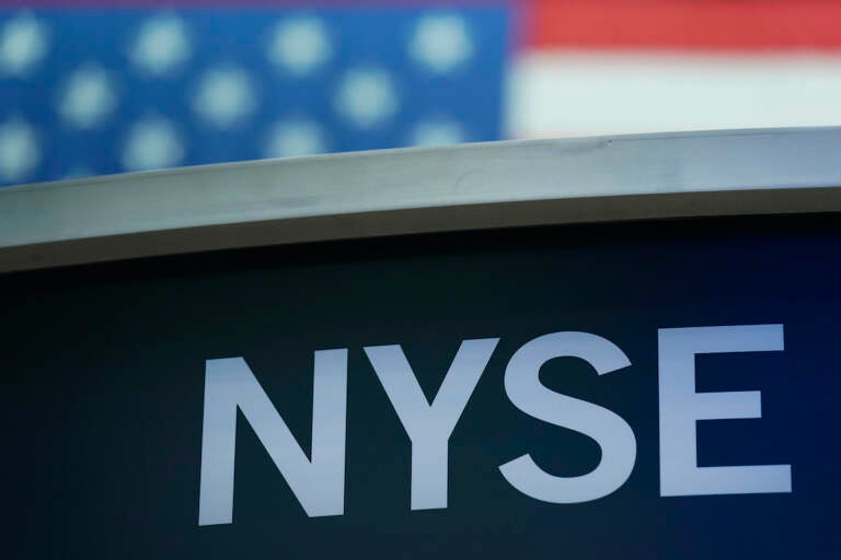 File photo: A sign for New York Stock Exchange is displayed on the floor at the NYSE in New York, Wednesday, July 27, 2022. (AP Photo/Seth Wenig, File)