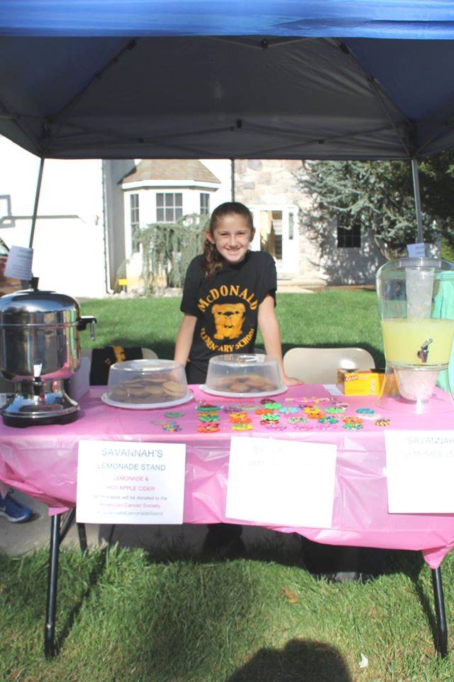 Savannah selling lemonade at her stand