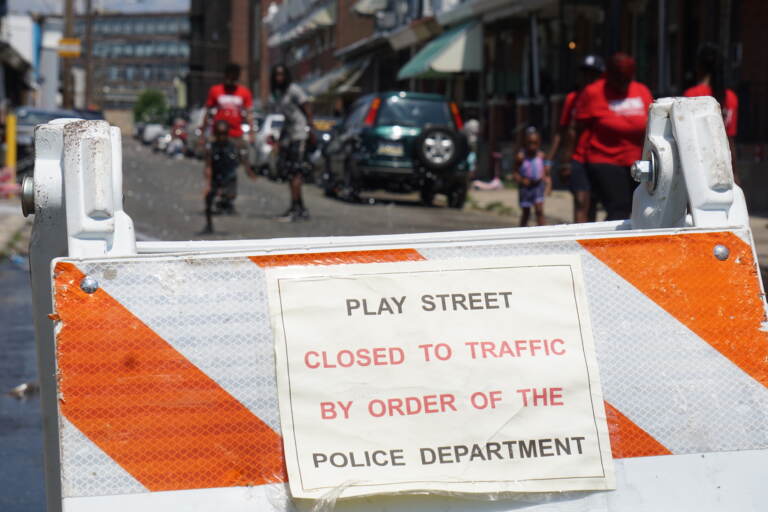 A sign marks a street in Kensington closed for use as a Playstreet. Sam Searles/WHYY