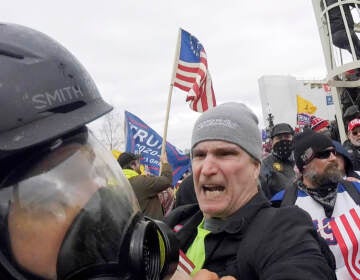 Alan William Byerly is seen attacking an Associated Press photographer during the insurrection at the U.S. Capitol
