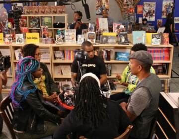 Black coffee shop owners gathered at Amalgam in 2018 for a live-streamed conversation about retail racism and supporting black businesses. Shop owner Ariell Johnson is at bottom left. (Emma Lee/WHYY)