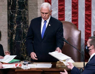Then-Vice President Mike Pence is seen in the House chamber early on Jan. 7, 2021, to finish the work of the Electoral College after pro-Trump insurrectionists stormed the Capitol