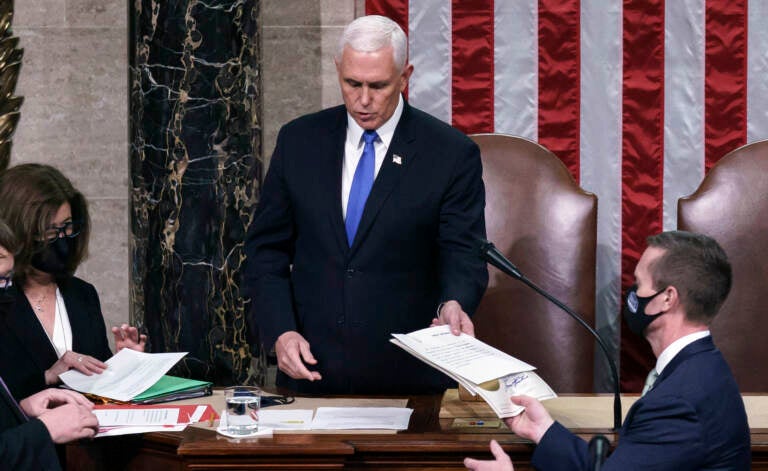 Then-Vice President Mike Pence is seen in the House chamber early on Jan. 7, 2021, to finish the work of the Electoral College after pro-Trump insurrectionists stormed the Capitol