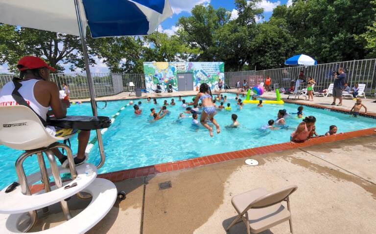 The pool was packed on opening day at North Camden Community Center, July 14, 2022. (Tom MacDonald / WHYY)