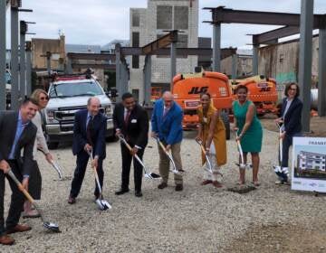 City officials participate in a groundbreaking for an affordable housing complex in Frankford