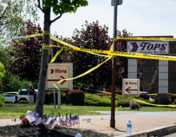 Police tape surrounds Tops Friendly Market