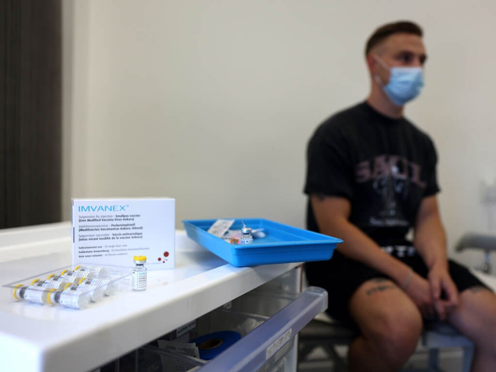 A man receives a vaccination dose against monkeypox in London