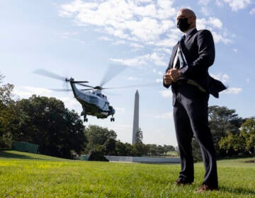 A U.S. Secret Service agent stands by as Marine One departs with President Biden aboard as he departs the White House in. (September 2021.
Kevin Dietsch/Getty Images)