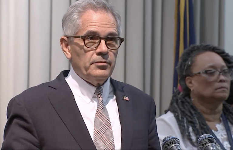 Philadelphia District Attorney Larry Krasner and Assistant District Attorney Jezreel Moore hold a news conference on the arrest of a woman who allegedly sold guns to minors. (6abc)