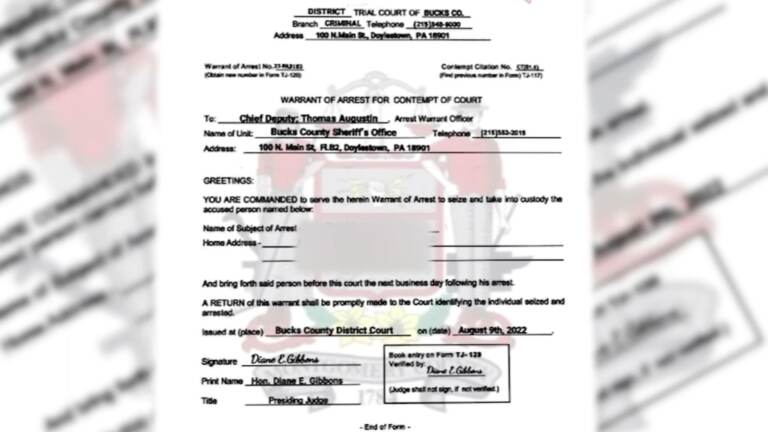 An image of a fake arrest warrant used by scammers in Bucks County.