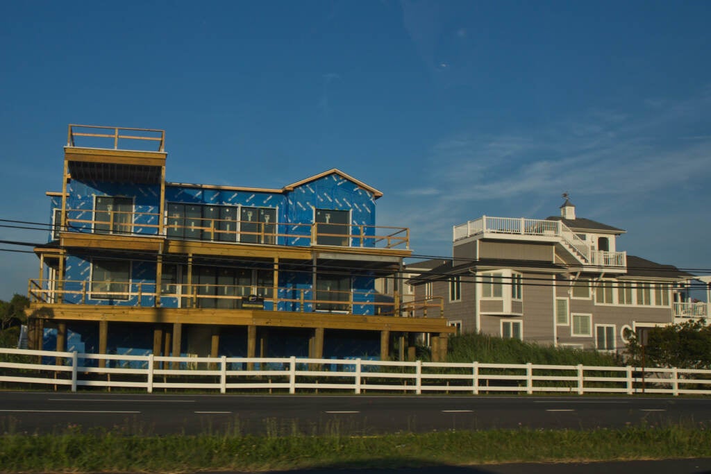 A beach home being constructed along coastal Route 1