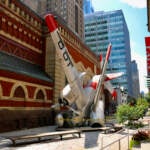 ''Grumman Greenhouse'' has occupied Lenfest Plaza at the Pennsylvania Academy of Fine Arts since 2011. The sculpture features a Navy war plane that has been converted into a greenhouse. (Emma Lee/WHYY)