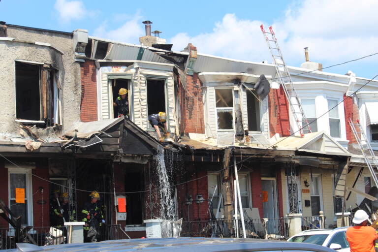 Philadelphia Fire Department putting out a fire on N. 59th St. in West Philly on August 2, 2022. (Cory Sharber/WHYY)