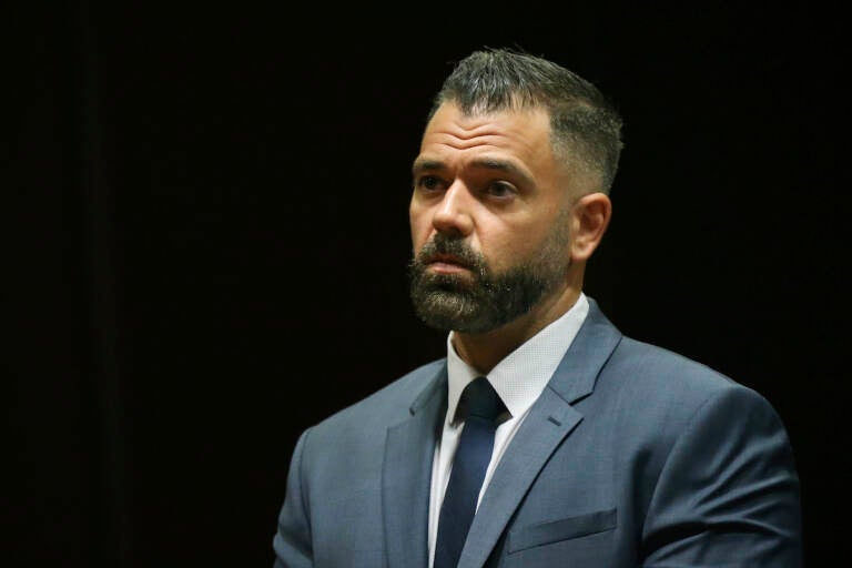 File photo: Mark D'Amico stands while pleading not guilty during his arraignment to charges including theft by deception at Burlington County Superior Court in Mount Holly, N.J., on Tuesday, May 28, 2019. ( Tim Tai/The Philadelphia Inquirer via AP, Pool)