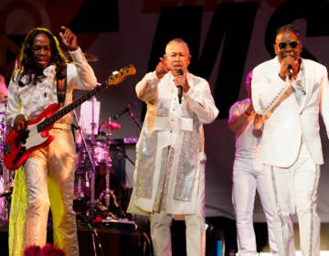 From left, Verdine White, Ralph Johnson and Philip Bailey of Earth, Wind & Fire perform at the Race to Erase MS drive-in event at the Rose Bowl, Friday, June 4, 2021, in Pasadena, Calif. (AP Photo/Chris Pizzello)