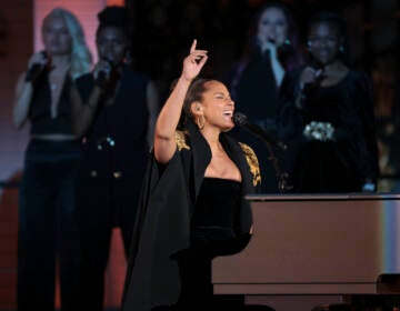 Alicia Keys performs during the Platinum Jubilee concert taking place in front of Buckingham Palace, London, Saturday June 4, 2022, on the third of four days of celebrations to mark the Platinum Jubilee. (Humphrey Nemar/Pool photo via AP)