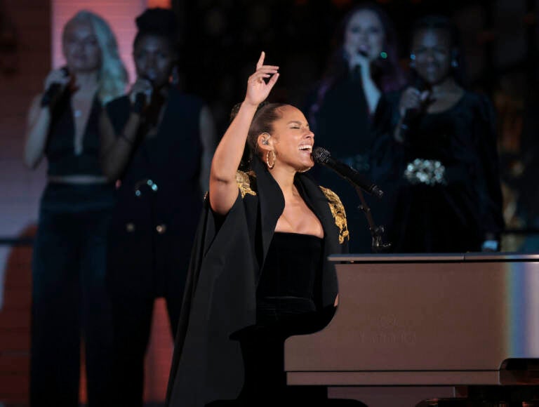 Alicia Keys performs during the Platinum Jubilee concert taking place in front of Buckingham Palace, London, Saturday June 4, 2022, on the third of four days of celebrations to mark the Platinum Jubilee. (Humphrey Nemar/Pool photo via AP)