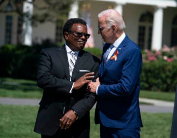 President Joe Biden talks with Garnell Whitfield Jr.