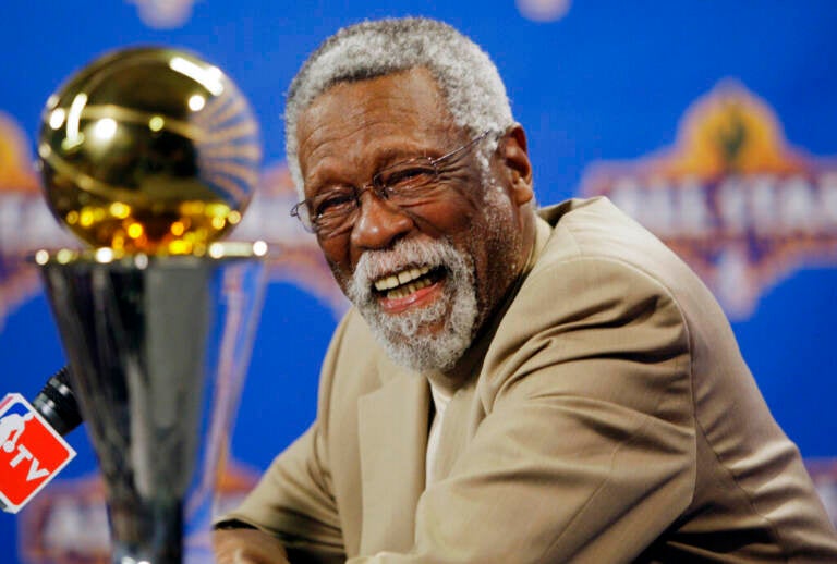 NBA great Bill Russell reacts at a news conference as he learns the most valuable player award for the NBA basketball championships has been renamed the Bill Russell NBA Finals Most Valuable Player Award, Feb. 14, 2009, in Phoenix. Russell has died at age 88. (AP Photo/Matt York)