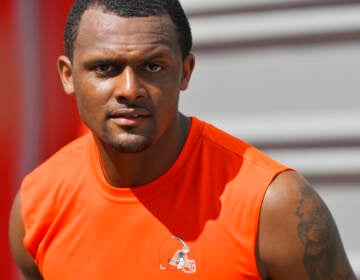 Cleveland Browns quarterback Deshaun Watson walks off the field after the NFL football team's training camp, Wednesday, Aug. 3, 2022, in Berea, Ohio. (AP Photo/David Richard)