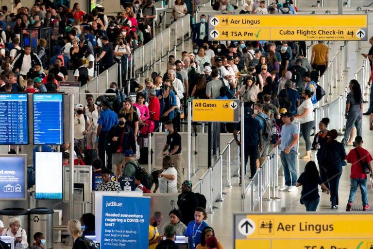 File photo: People wait in a TSA line at the John F. Kennedy International Airport on June 28, 2022, in New York. (AP Photo/Julia Nikhinson, File)