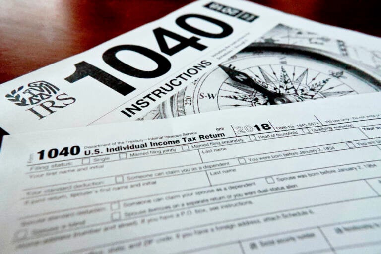 File photo: Internal Revenue Service taxes forms are seen on Feb. 13, 2019. (AP Photo/Keith Srakocic, File)