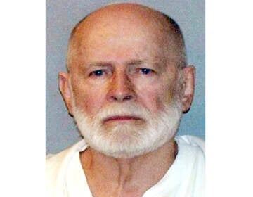 This June 23, 2011, file booking photo provided by the U.S. Marshals Service shows James ''Whitey'' Bulger. Three men, including a Mafia hitman, have been charged in the killing of Bulger in a West Virginia prison. The Justice Department announced the charges against Fotios 