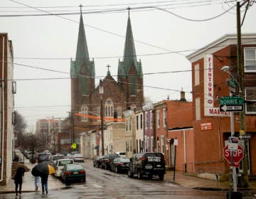 File photo: This Feb. 23, 2016 file photo shows the St. Laurentius Roman Catholic church in Philadelphia.  Demolition of a shuttered 19th-century church in Philadelphia has begun following a yearslong battle by some neighbors to save the crumbling structure. Crews last week surrounded the 140-year-old St. Laurentius Church in Fishtown with scaffolding, fencing and barricades. Neighbors gathered Wednesday, Aug. 17, 2022 to get their final look at the structure. (AP Photo/Matt Rourke, File)