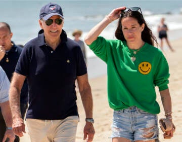 File photo: President Joe Biden walks on the beach with daughter Ashley Biden, in Rehoboth Beach, Del., June 20, 2022. (AP Photo/Manuel Balce Ceneta, File)