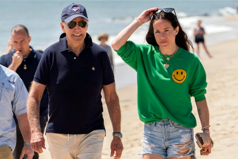 File photo: President Joe Biden walks on the beach with daughter Ashley Biden, in Rehoboth Beach, Del., June 20, 2022. (AP Photo/Manuel Balce Ceneta, File)