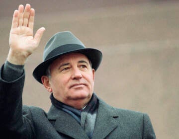 File photo: Soviet President Mikhail Gorbachev waves from the Red Square tribune during a Revolution Day celebration, in Moscow, Soviet Union, Tuesday, Nov. 7, 1989.  (AP Photo/Boris Yurchenko, File)