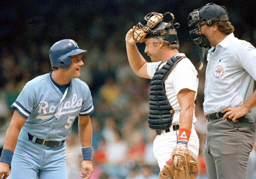 George Brett in 2 early versions of the powder blue jersey.