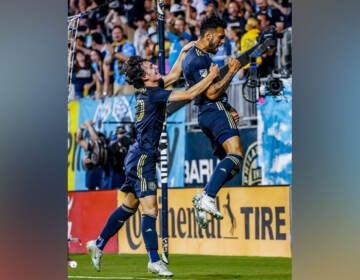 Philadelphia Union defender Matt Real (right) and midfielder Paxten Aaronson celebrate the team's sixth goal of a 6-0 against the Colorado Rapids on Aug 27, 2022 in Chester, Pa. (@PhilaUnion/Twitter)