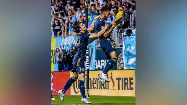 Philadelphia Union defender Matt Real (right) and midfielder Paxten Aaronson celebrate the team's sixth goal of a 6-0 against the Colorado Rapids on Aug 27, 2022 in Chester, Pa. (@PhilaUnion/Twitter)