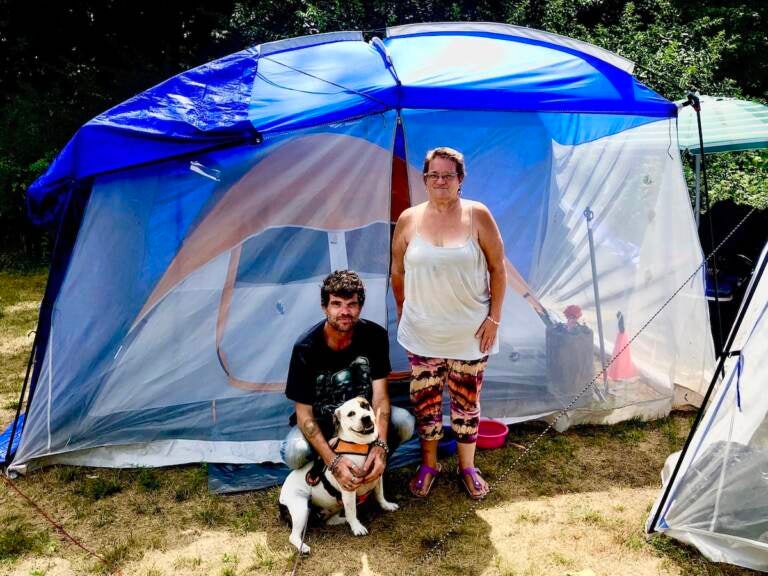 Tony Morano, 38 (left), and Anne Douglass, 60, set up tents along the bike path in Norristown. (Courtesy of Mark Boorse)