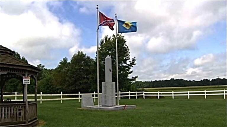 The Confederate flag and monument at the Marvel Carriage Museum. (WHYY file)