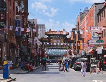 Chinatown is full of retail and commercial activity, but many people also live there — on both sides of I-676. (Tiffany Rodriguez / WHYY)