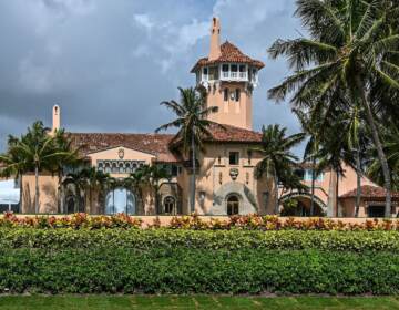 The FBI searched former President Donald Trump's residence in Florida on Aug. 8. The U.S. intelligence community will assess whether the documents taken pose a threat to national security, a spokesperson for the Office of the Director of National Intelligence told NPR. (Giorgio Viera/AFP via Getty Images)