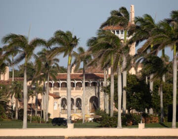 A federal judge ordered the Justice Department to provide a redacted copy of the affidavit used to justify the FBI search of former President Trump's Mar-a-Lago residence, saying he believed the affidavit should be partially released. (Joe Raedle/Getty Images)