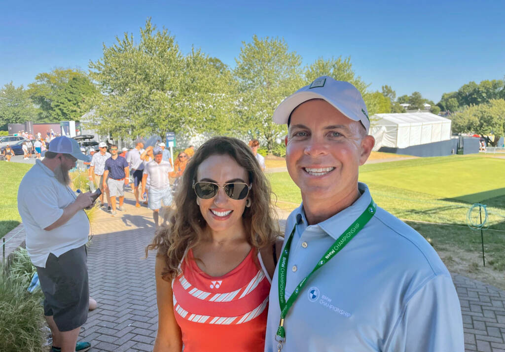 Christine and Jeff Mitchell pose for a photo at the PGA tour in Wilmington