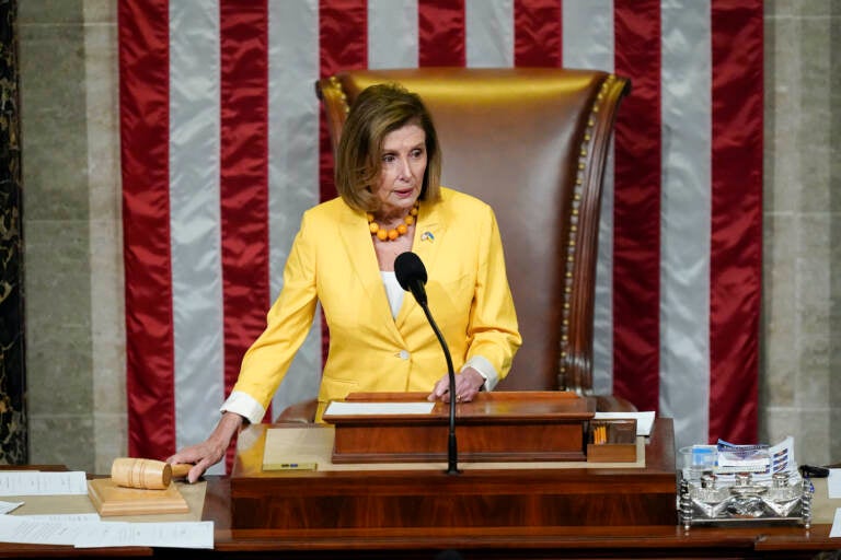 House Speaker Nancy Pelosi of Calif., finishes the vote to approve the Inflation Reduction Act in the House chamber at the Capitol in Washington, Friday, Aug. 12, 2022. A divided Congress gave final approval Friday to Democrats' flagship climate and health care bill. (AP Photo/Patrick Semansky)