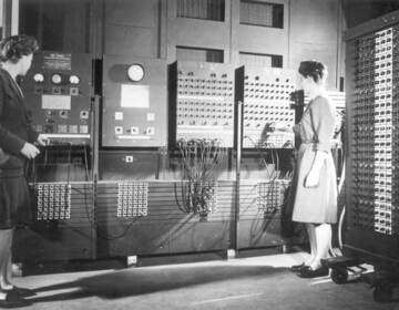 Jean Bartik (left) and Frances Spence operating the ENIAC’s main control panel. (photo credit U.S. Army and University of Pennsylvania)