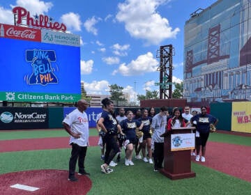 'Ringing the bell' at Citizens Bank Park on August 24, 2022, to get ready for the new school year. (Philadelphia School District)