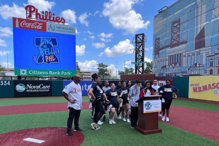'Ringing the bell' at Citizens Bank Park on August 24, 2022, to get ready for the new school year. (Philadelphia School District)