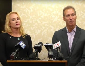 Mary Znidarsic-Nicosia and her husband Nicholas Nicosia, pictured at their press conference in Rochester, NY, on Tuesday. The two deny allegations of racism and now blame 