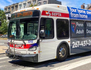 A SEPTA bus is seen traveling down a street in Philadelphia.