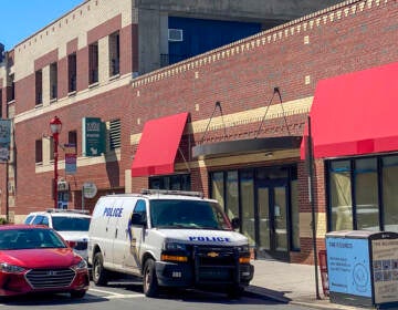 A police van is pictured on South Street in Philly